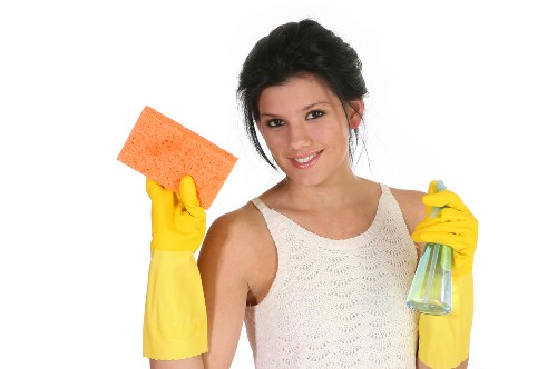 Deep cleaning a fabric sofa in a central London property