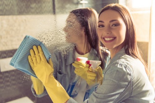 Office cleaners maintaining a professional workspace in W1G