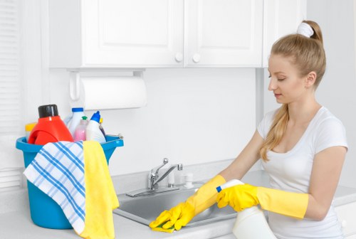 Technician checking carpet cleaning equipment and hazards